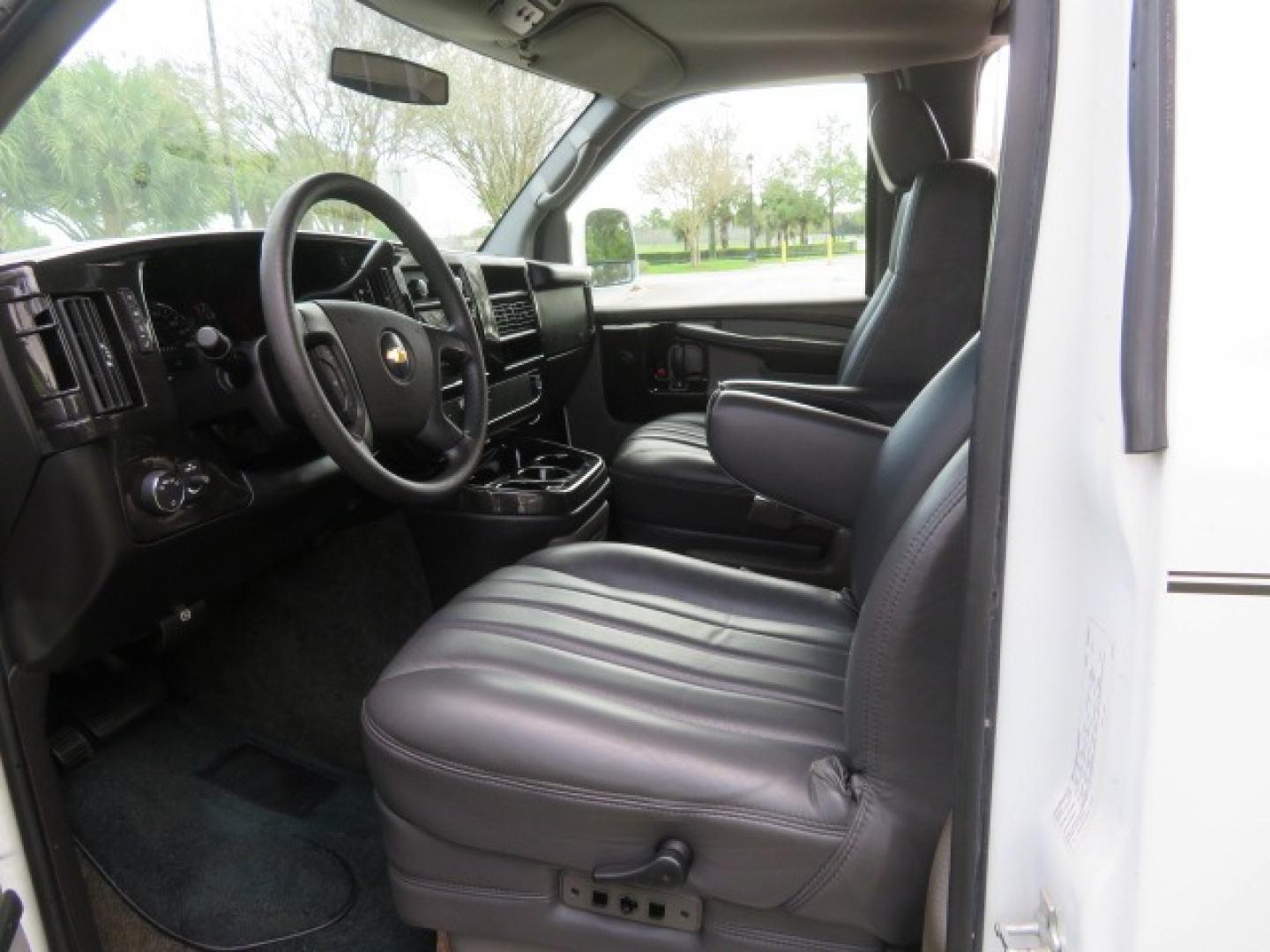 2010 White /Gray Chevrolet Express (1GNUGCD48A1) , located at 4301 Oak Circle #19, Boca Raton, FL, 33431, (954) 561-2499, 26.388861, -80.084038 - You are looking at a Gorgeous 2010 Chevy Express Handicap Wheelchair Conversion Van Explorer Limited SE with 31K Original Miles, Braun Century 750lb Side Entry Wheelchair lift, Tie Down System in the Floor, Rear Entertainment with Flat Screen TV/DVD, Leather Interior, Rear Power Folding Bench Seat/b - Photo#75